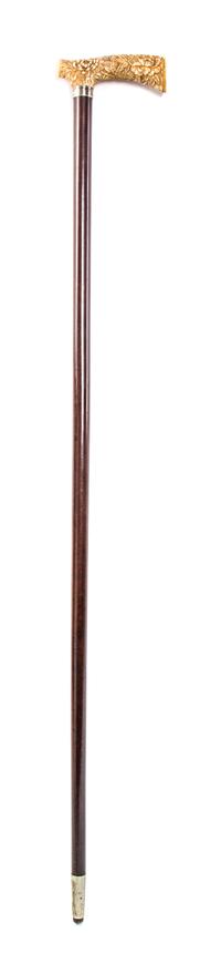 A Japanese Ivory Handled Cane, Length of handle 4 1/8 x length overall 33 3/4 inches.