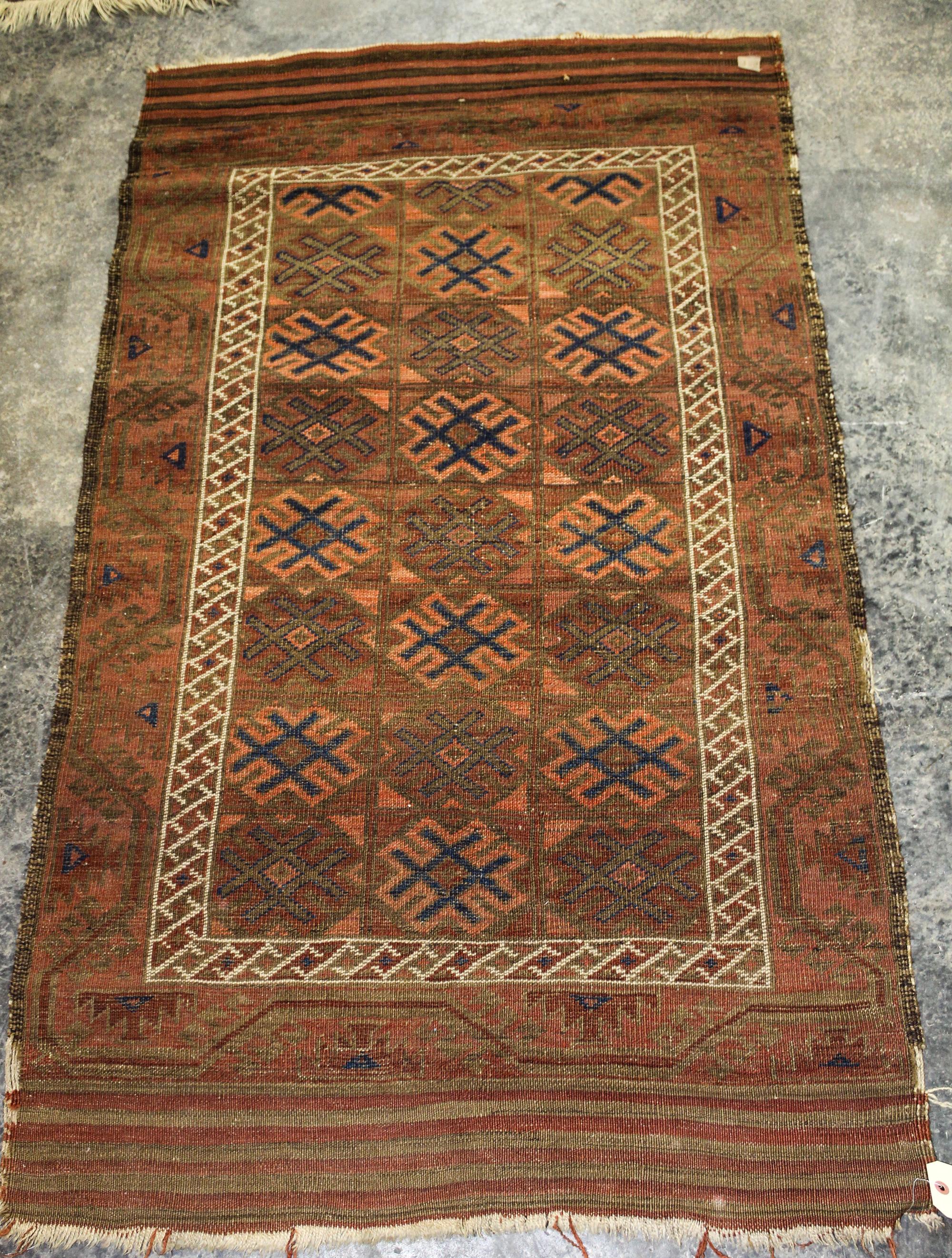 A Caucasian Wool Rug 4 feet 11 inches x 2 feet 10 inches. — EARLY 20TH CENTURY