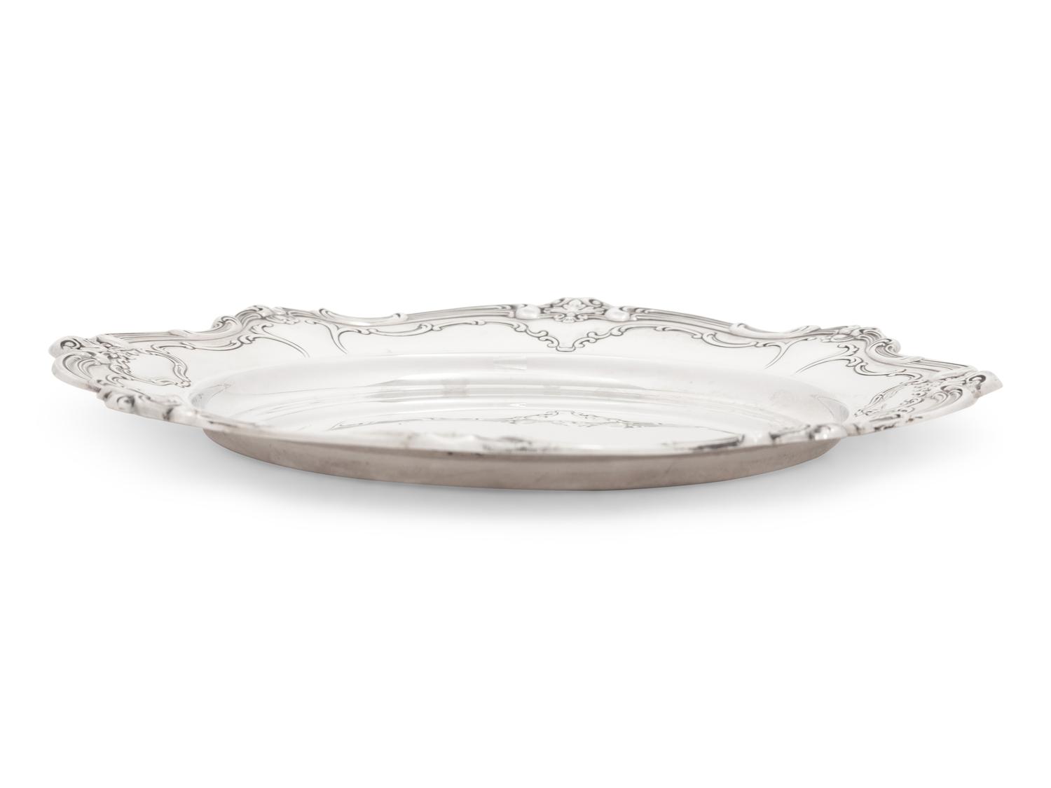 A Set of Twelve American Silver Bread Plates