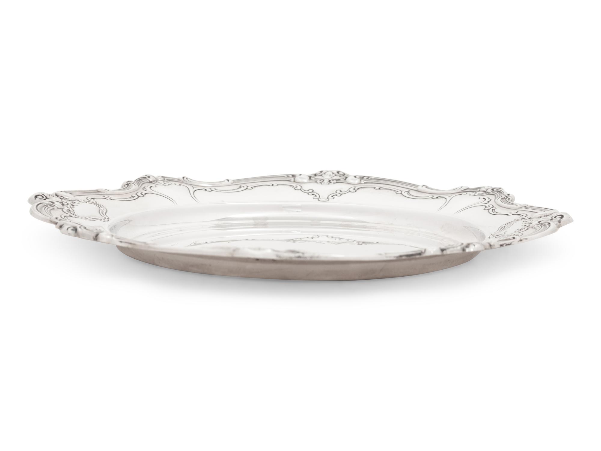 A Set of Twelve American Silver Bread Plates