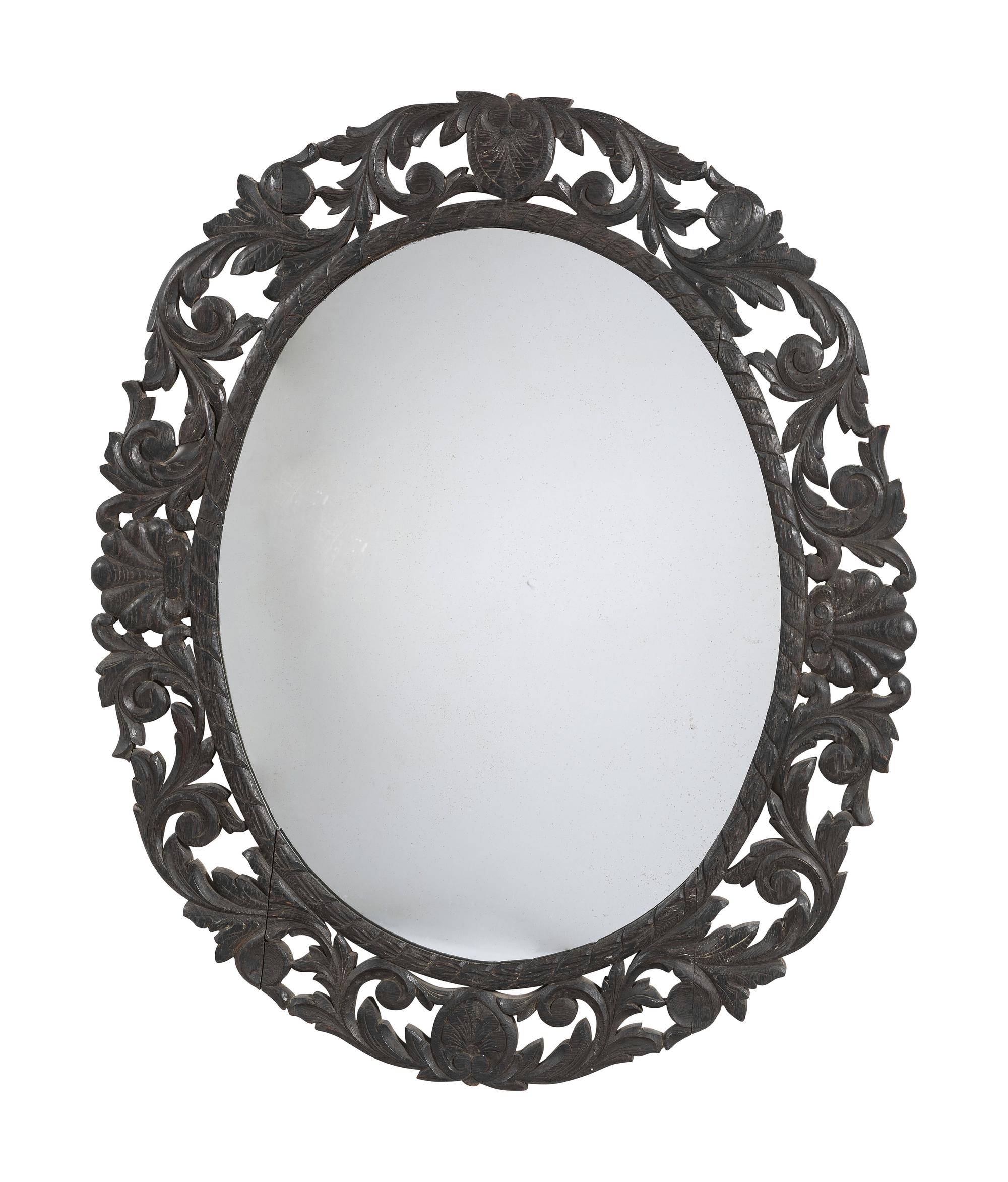 A Carved and Stained Pine Baroque Style Hall Mirror
