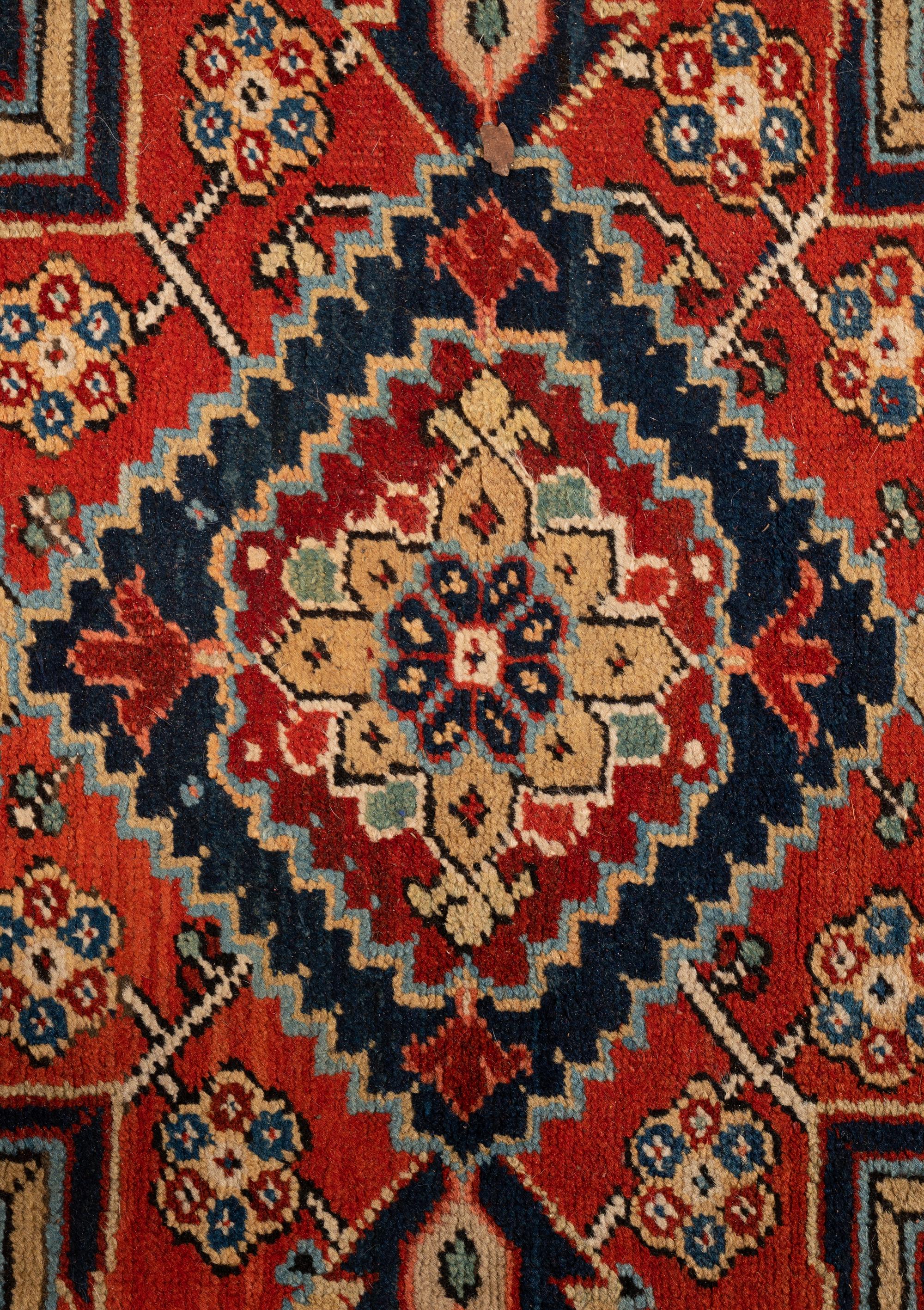 A Heriz Wool Rug