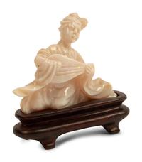 A Chinese Carved Opal Figure of a Musical Lady