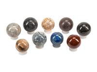A Set of Nine Specimen Marble Spherical Ornaments