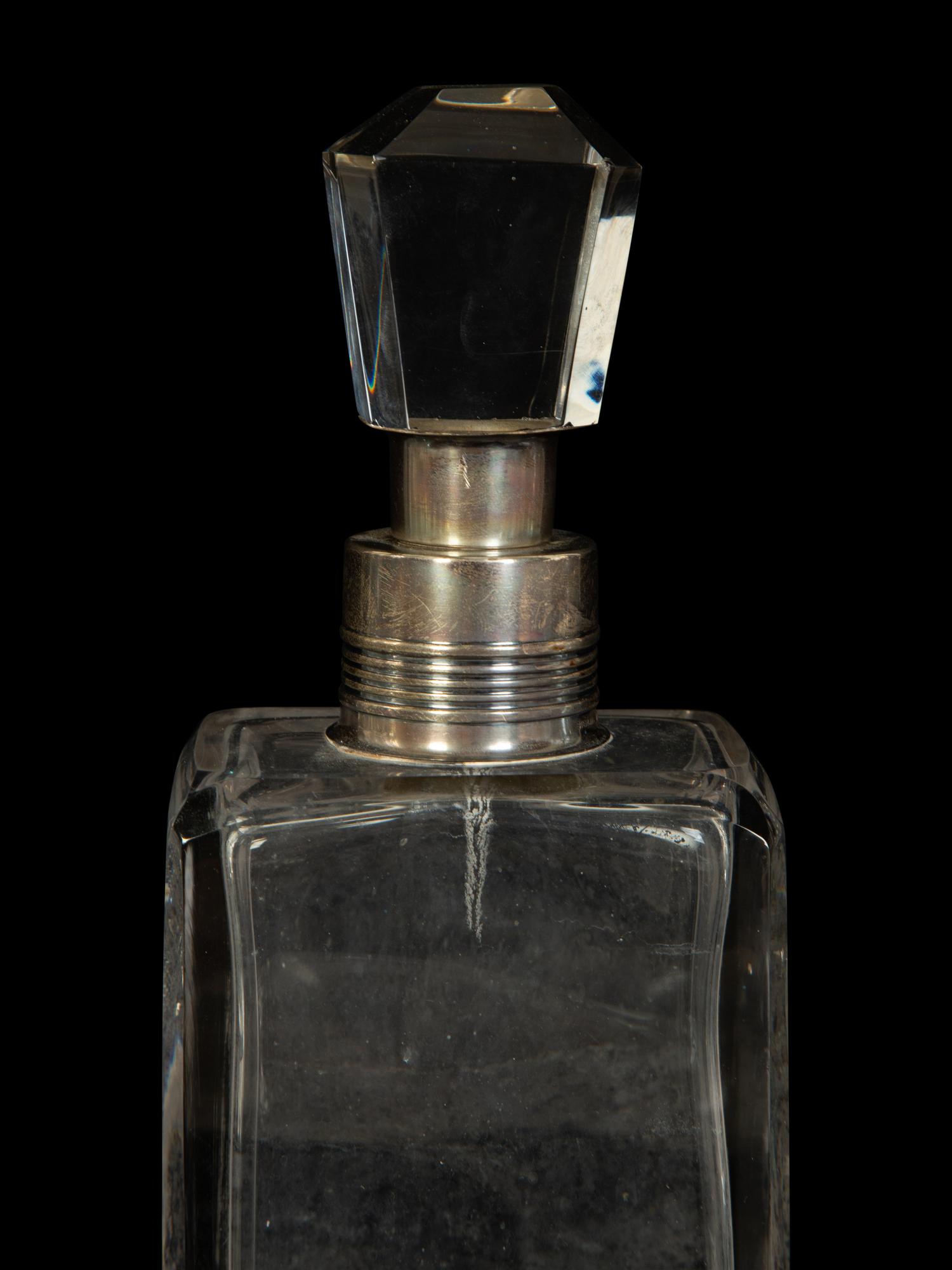 Four American Silver Mounted Cut Glass Decanters
