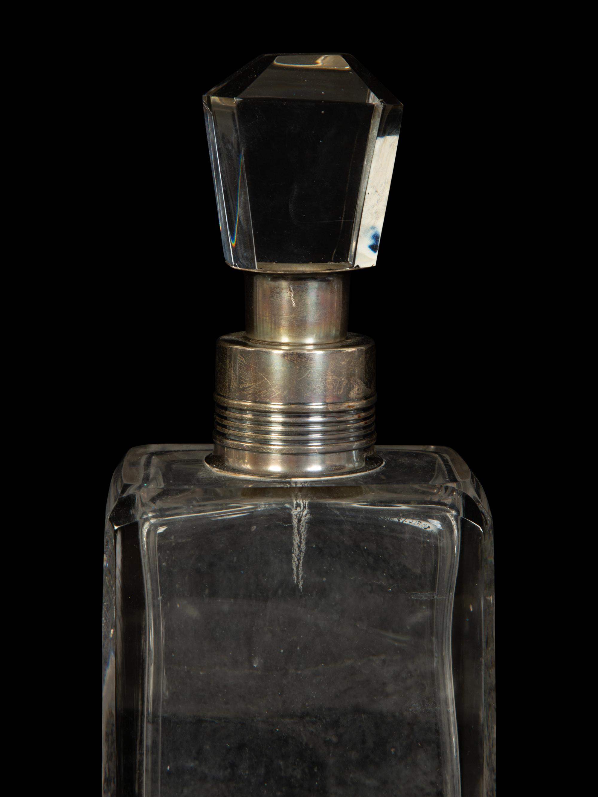 Four American Silver Mounted Cut Glass Decanters