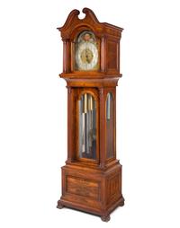 An Elliott Walnut Nine-Tube Tall Case Clock