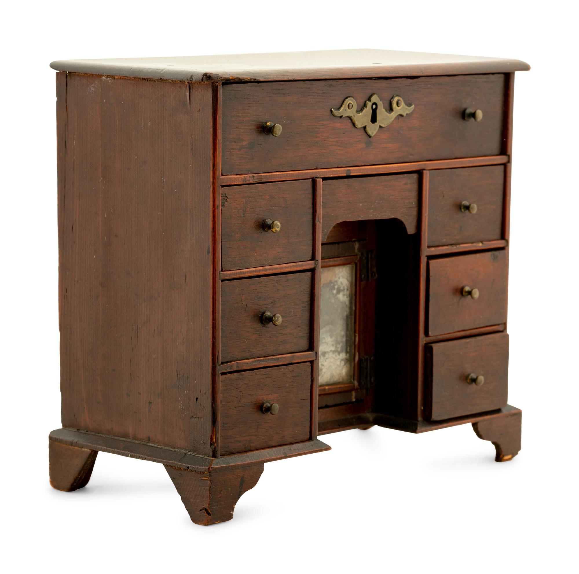 A George III Style Mahogany Diminutive Kneehole Desk