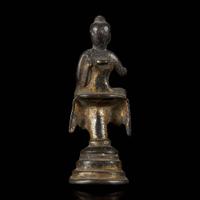 A small gilt bronze figure of a seated Buddha 铜鎏金佛造像一尊 Possibly Tang dynasty ??