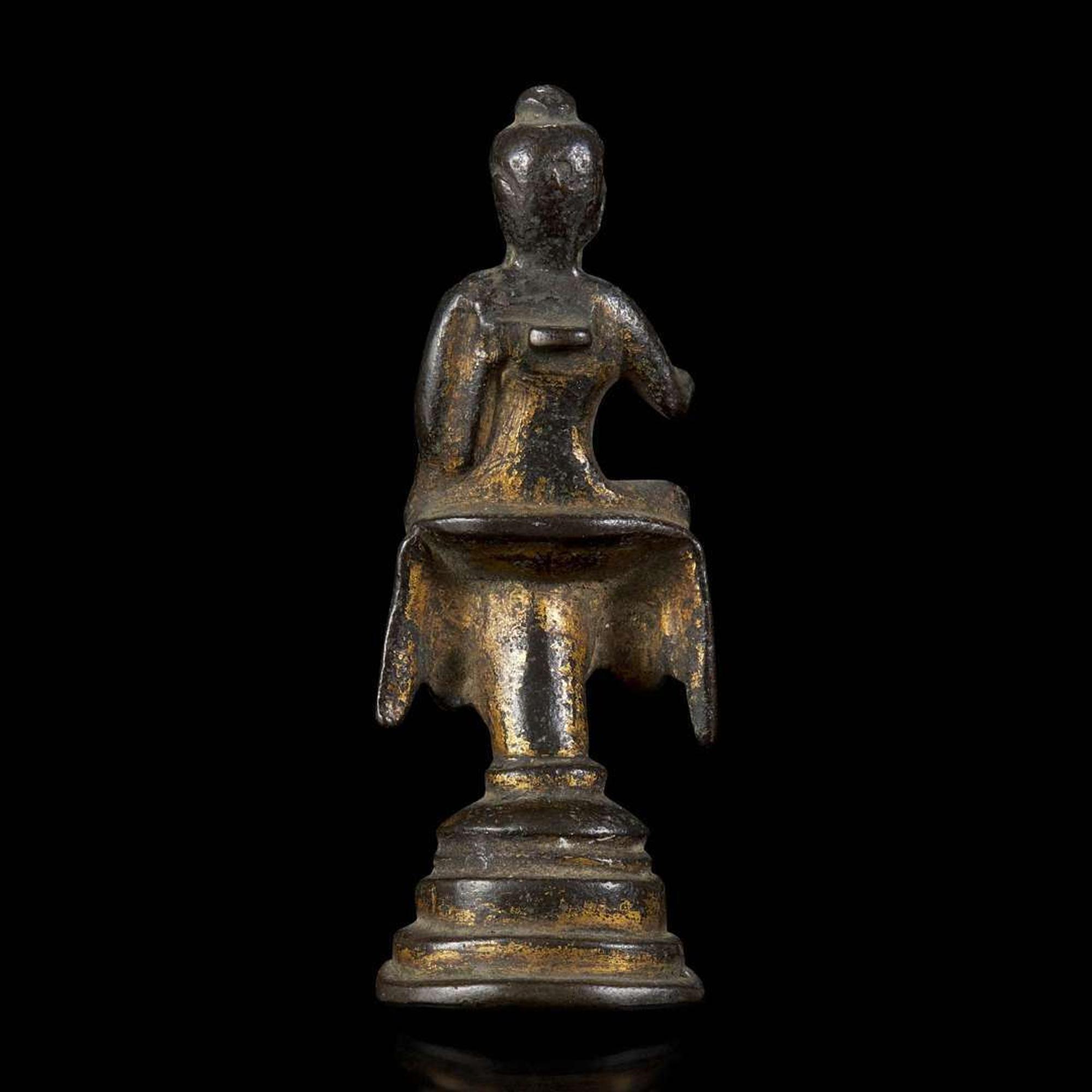 A small gilt bronze figure of a seated Buddha 铜鎏金佛造像一尊 Possibly Tang dynasty ??