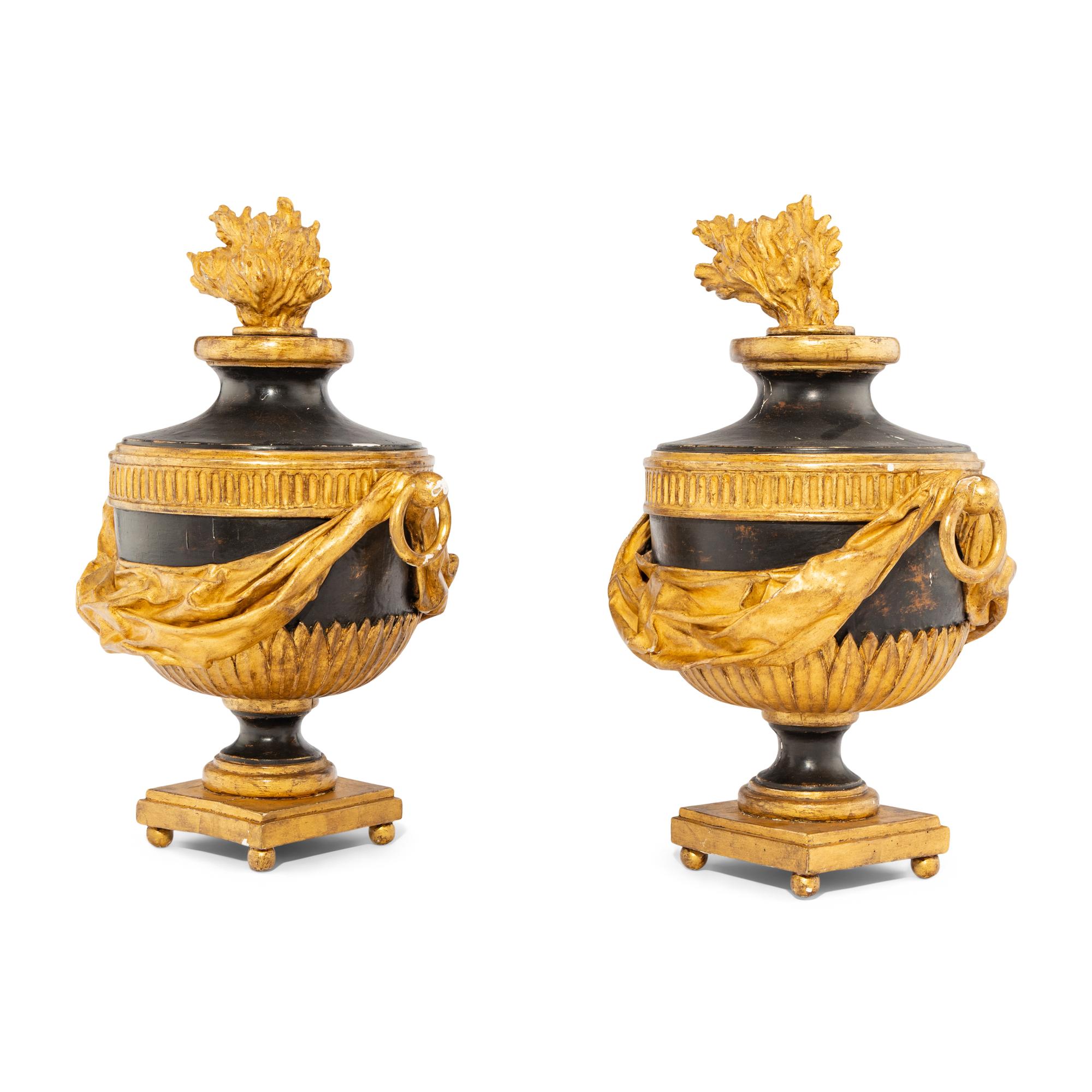 A Pair of Neoclassical Style Painted and Parcel Giltwood Flaming Urns