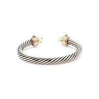 STERLING SILVER, YELLOW GOLD AND GEMSTONE 'RENAISSANCE' CUFF BRACELET