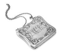 A German Silver Purse, 19th/20th Century, of shaped rectangular form, worked to show floral and foliate decoration and centered by a sh