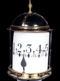 A Gilt and Patinated Lighthouse Annular Clock