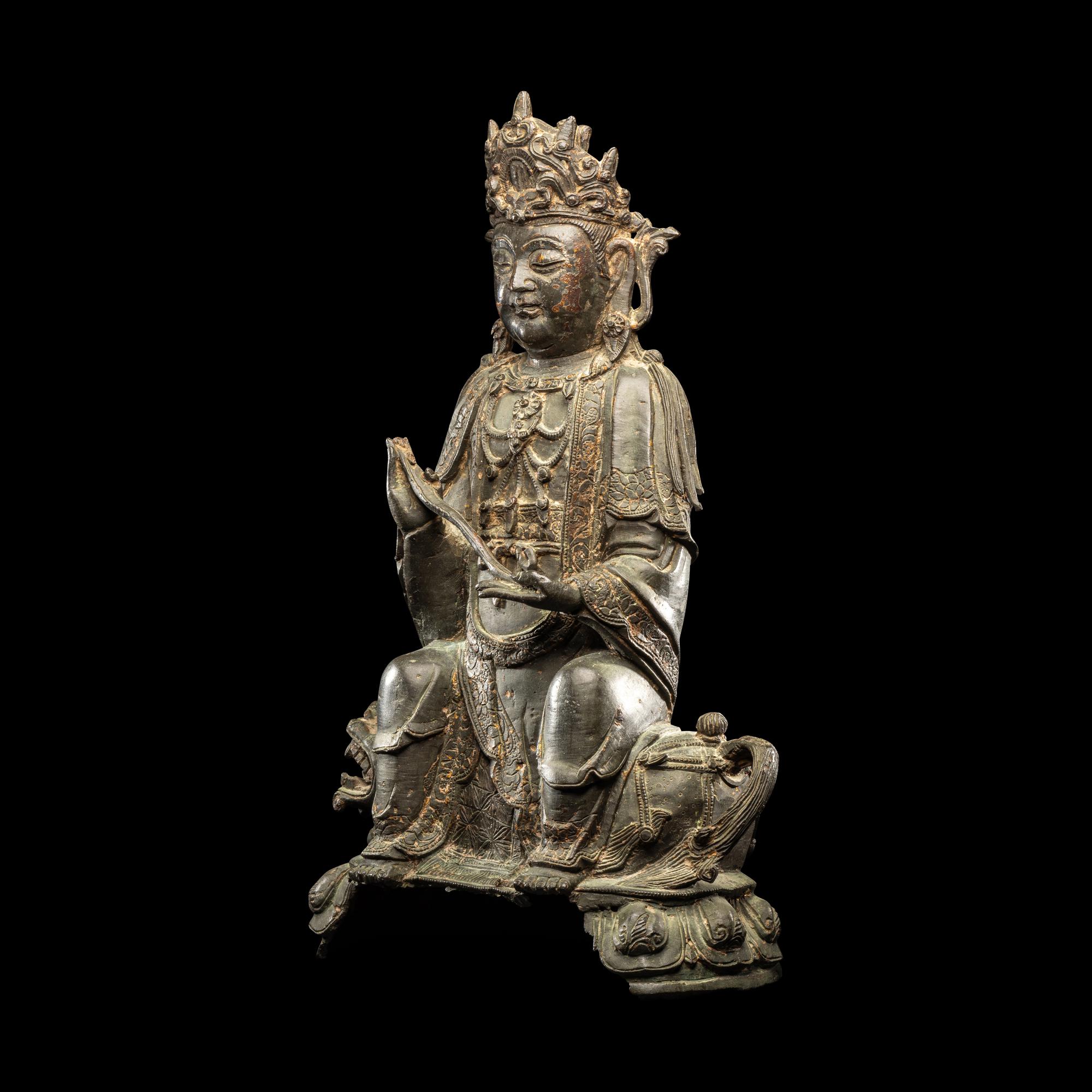 A Chinese Parcel-Gilt Bronze Figure of Guanyin, Ming Dynasty 明 銅局部鎏金觀音坐像