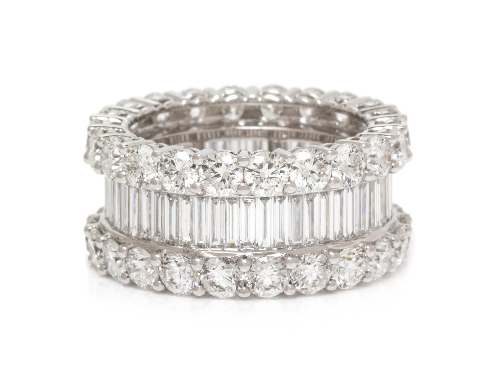 An 18 Karat White Gold and Diamond Eternity Band, 6.50 dwts.