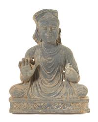 A Gandharan Schist Figure of a Seated Buddha Height 18 1/2 inches. — CIRCA 12TH-13TH CENTURY