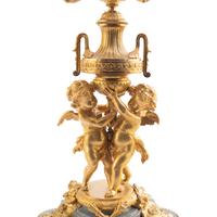 A Pair of Louis XV Style Gilt Bronze and Persian Grey Marble Six-Light Candelabra
