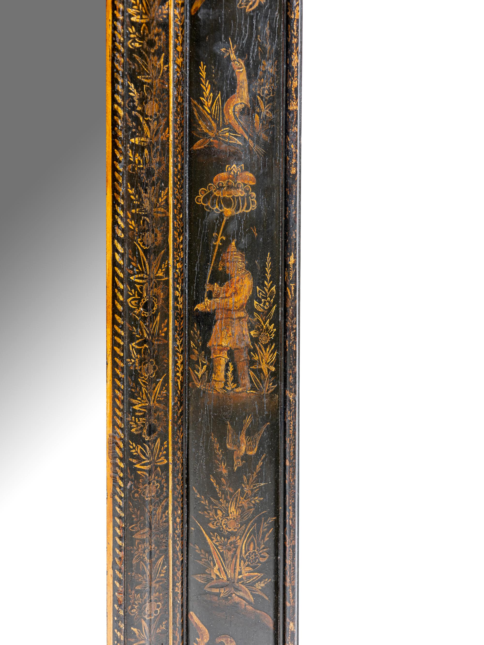 A North Italian Black Japanned Cushion Mirror