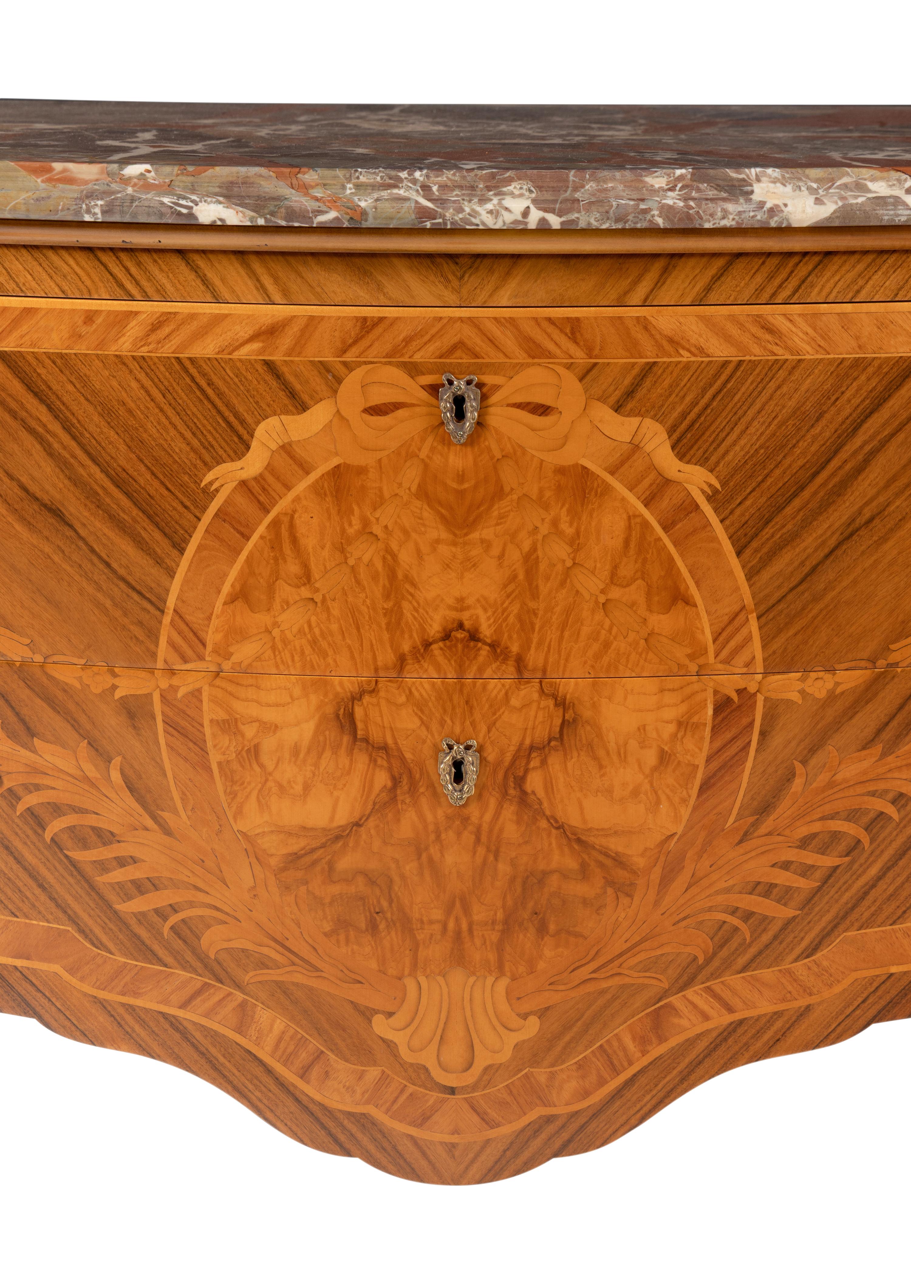 A Louis XV Style Gilt-Bronze Mounted Marquetry Commode
