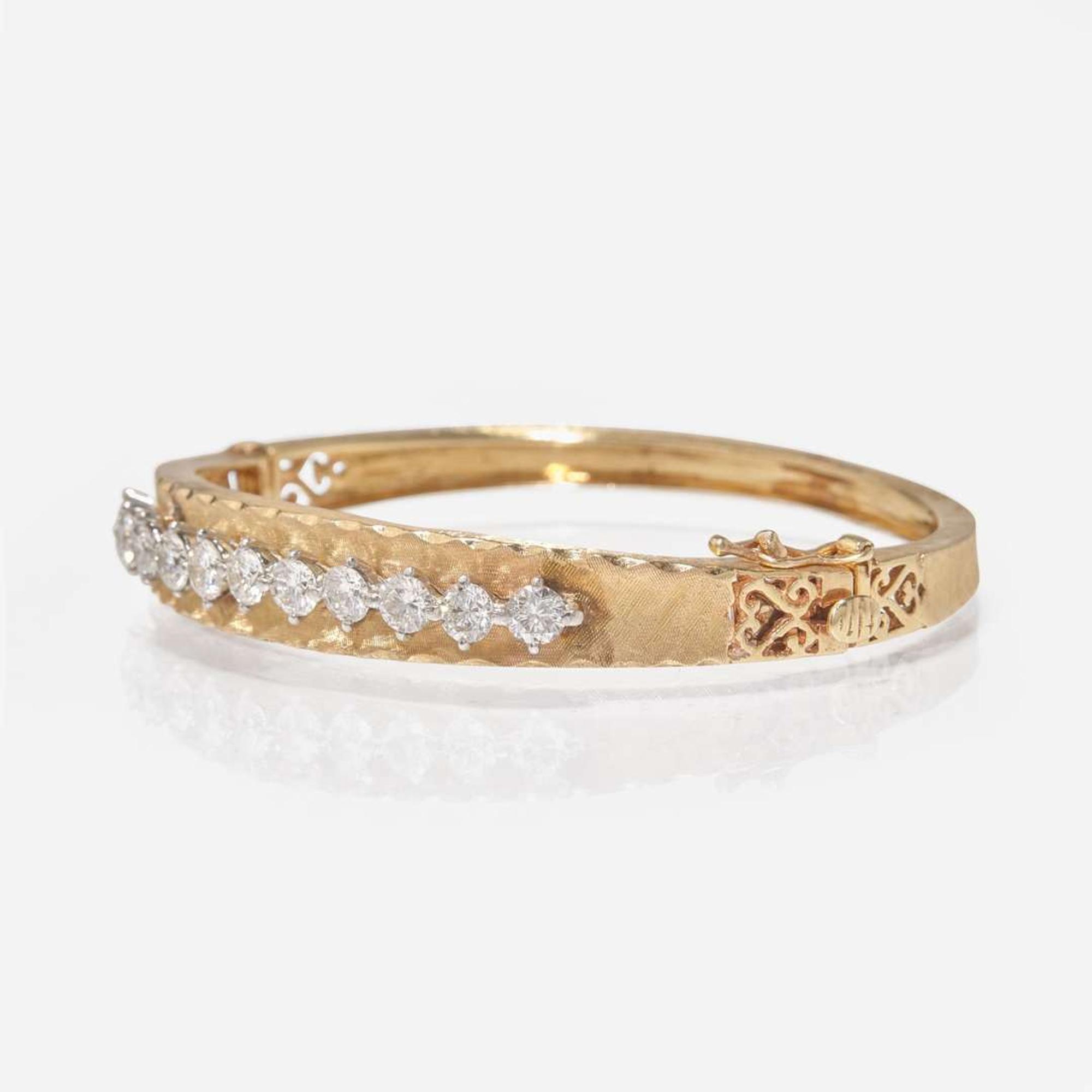 A 14K Gold and Diamond Bangle Bracelet