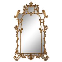An Italian Rococo Revival Carved Giltwood Mirror