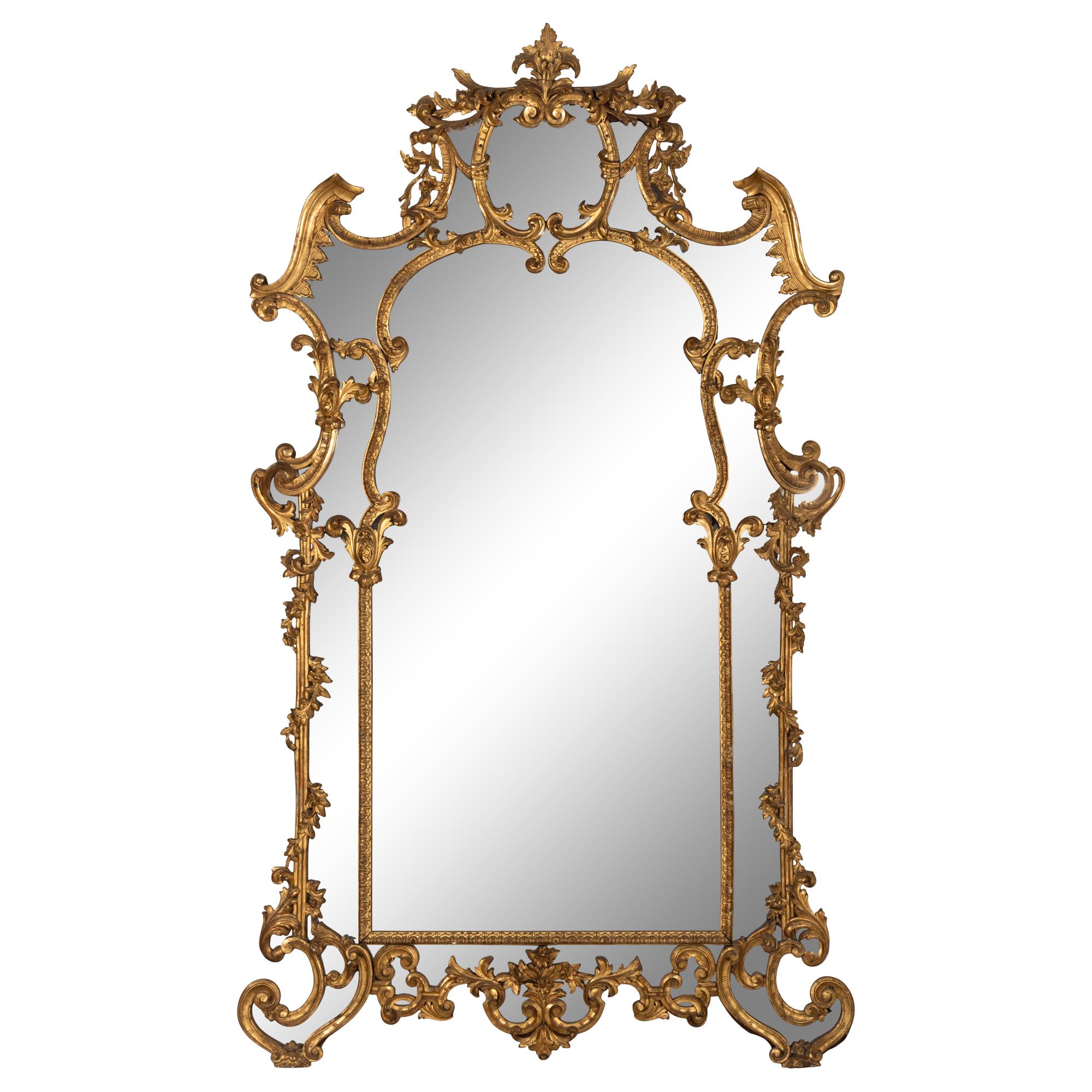 An Italian Rococo Revival Carved Giltwood Mirror