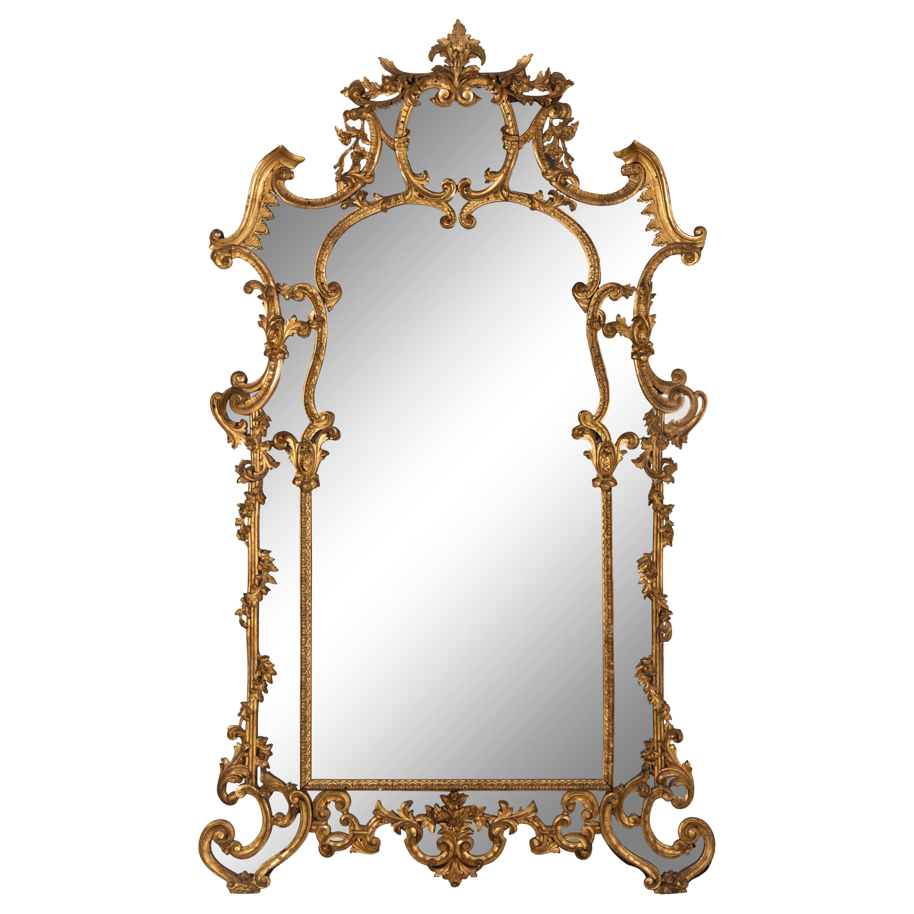 An Italian Rococo Revival Carved Giltwood Mirror