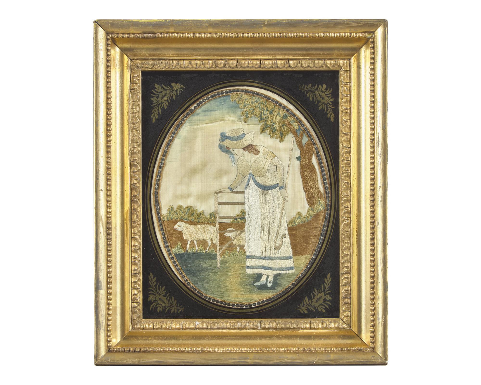 A George III Needlework Picture Depicting a Shepherdess with Sheep