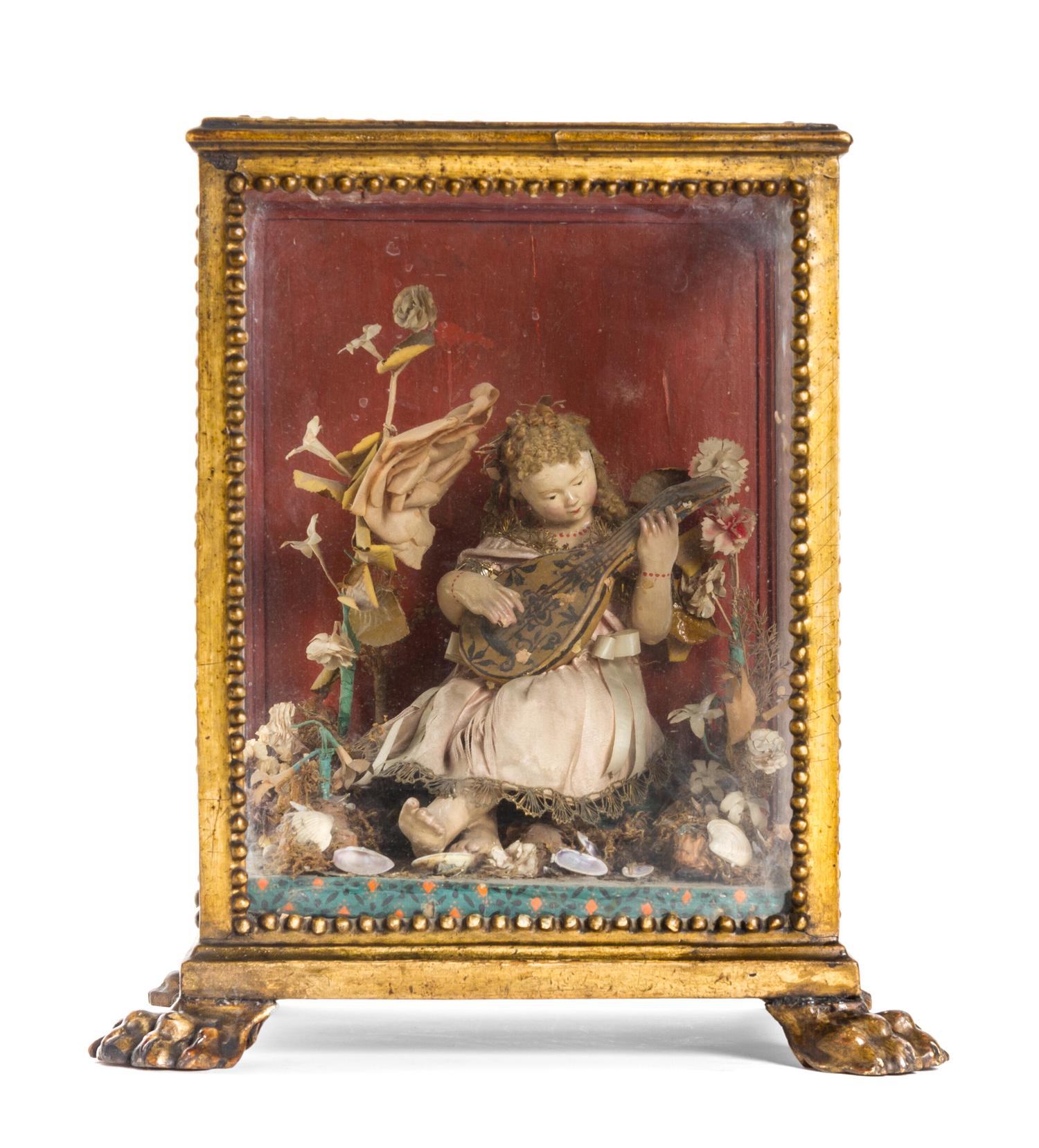 An Italian Creche Figure, Height 13 3/4 x width 12 1/4 x depth 9 1/4 inches.