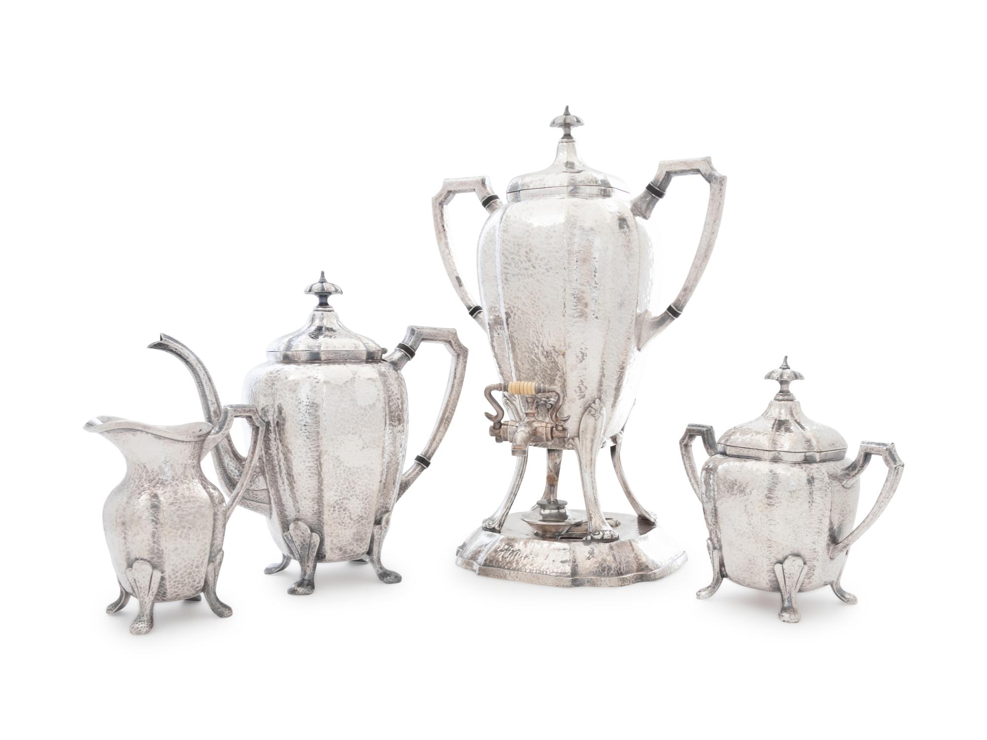 An American Arts & Crafts Silver-Plate Four-Piece Tea Service