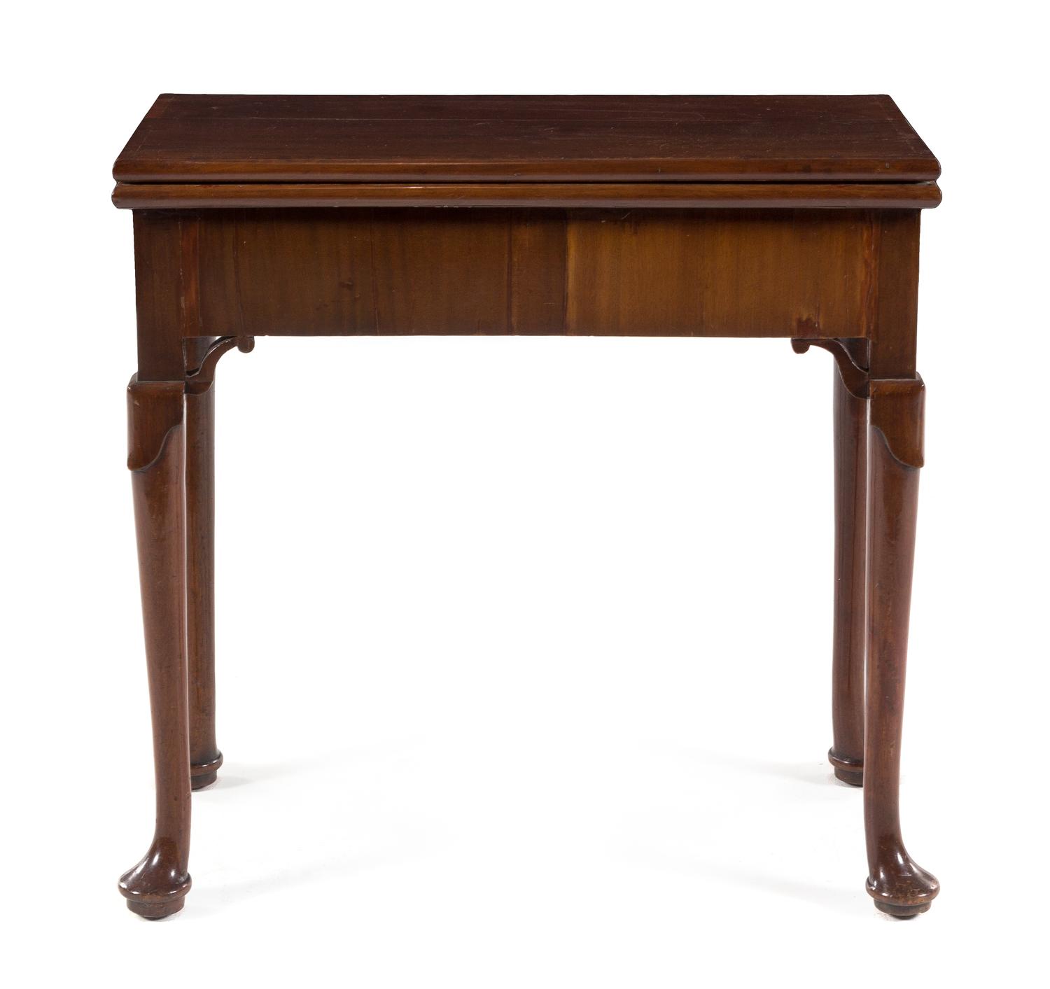 A George III Mahogany Flip-Top Game Table Height 28 3/4 x width 29 x depth 14 3/8 inches (closed). — 18TH/19TH CENTURY