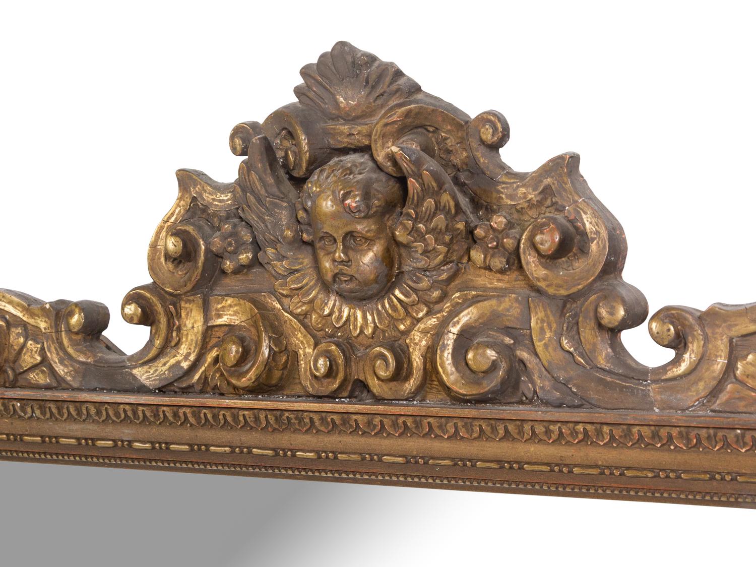An Italian Baroque Style Giltwood Mirror