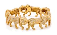 An 18 Karat Yellow Gold, Diamond and Colored Diamond Panther Bracelet, 47.95 dwts.