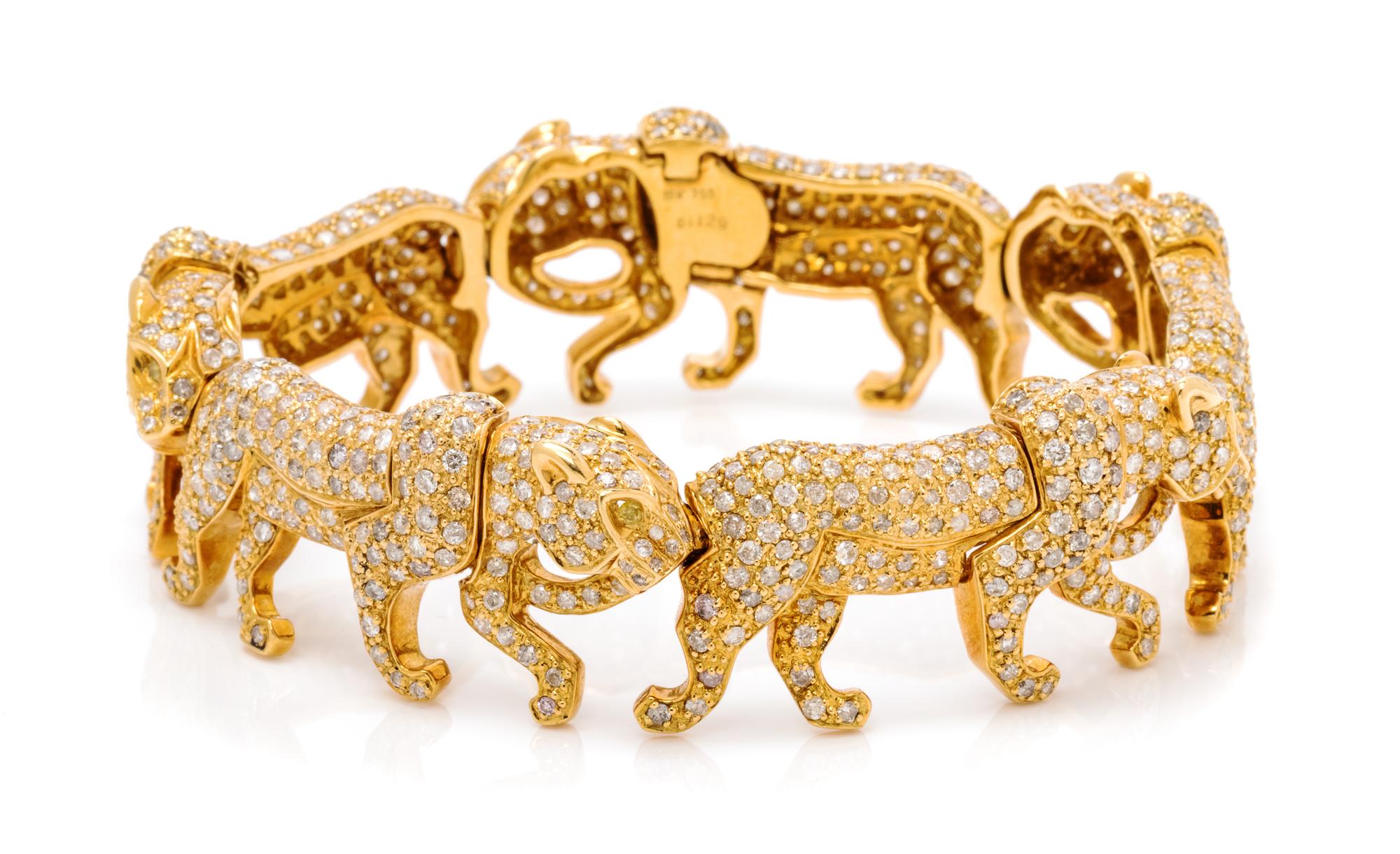An 18 Karat Yellow Gold, Diamond and Colored Diamond Panther Bracelet, 47.95 dwts.