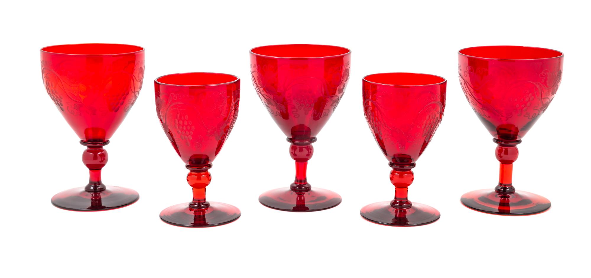 Five Steuben Selenium Red Glasses in the Grape Pattern Height of tallest 5 1/8 inches. — 20TH CENTURY