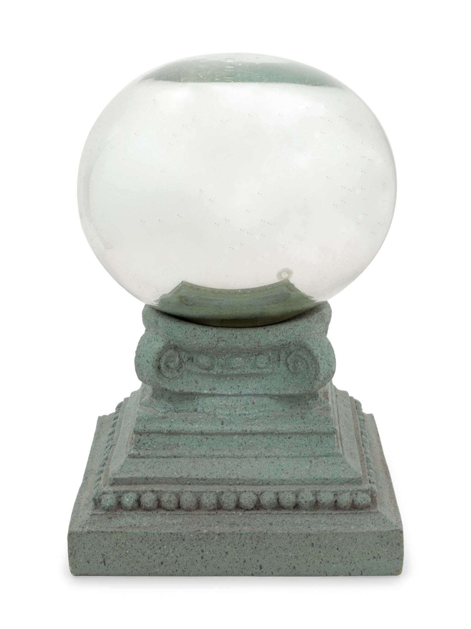 A Mercury Glass Ball With Later Resin Stand