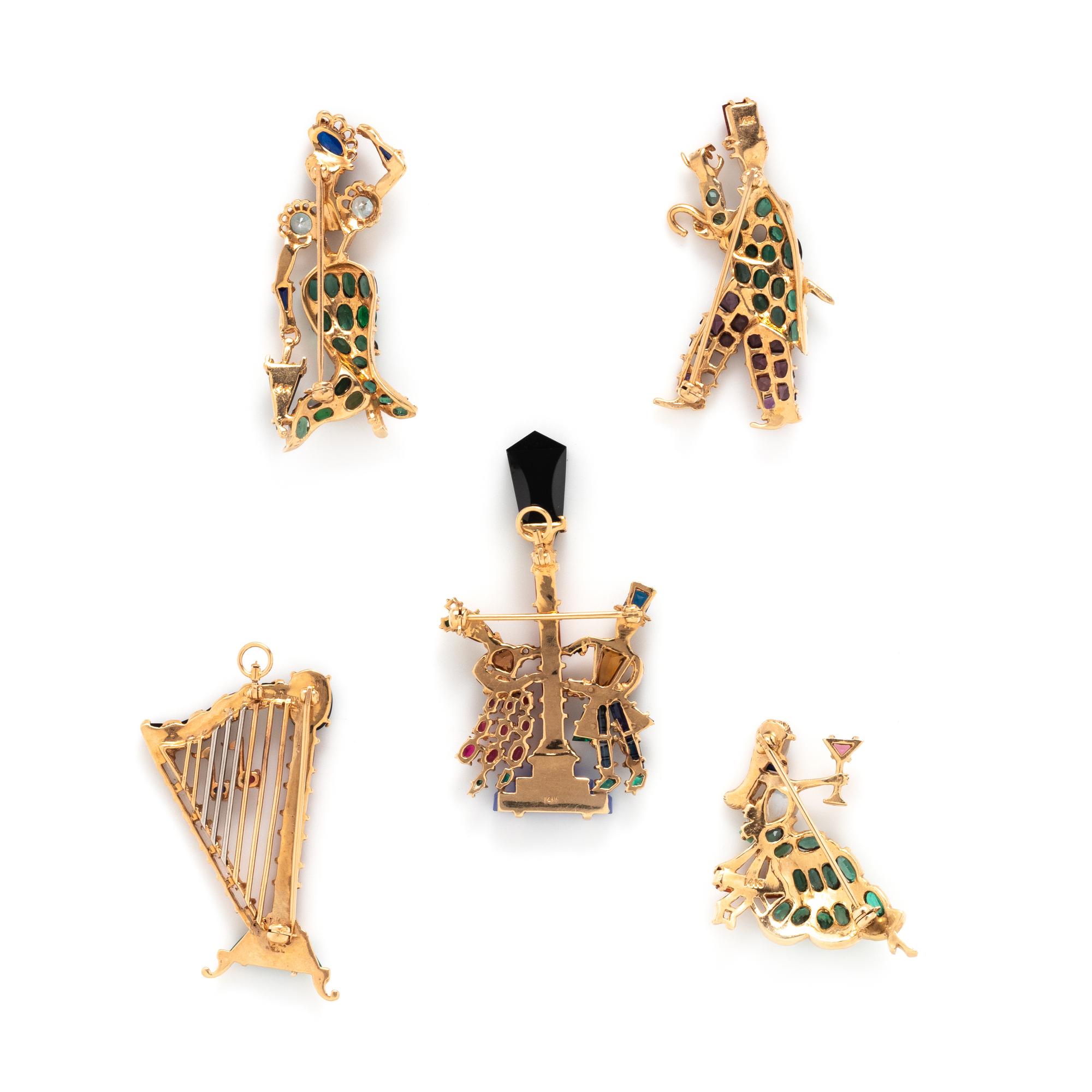 COLLECTION OF YELLOW GOLD AND GEMSTONE BROOCHES