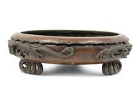 A Bronze 'Dragon' Tripod Censer