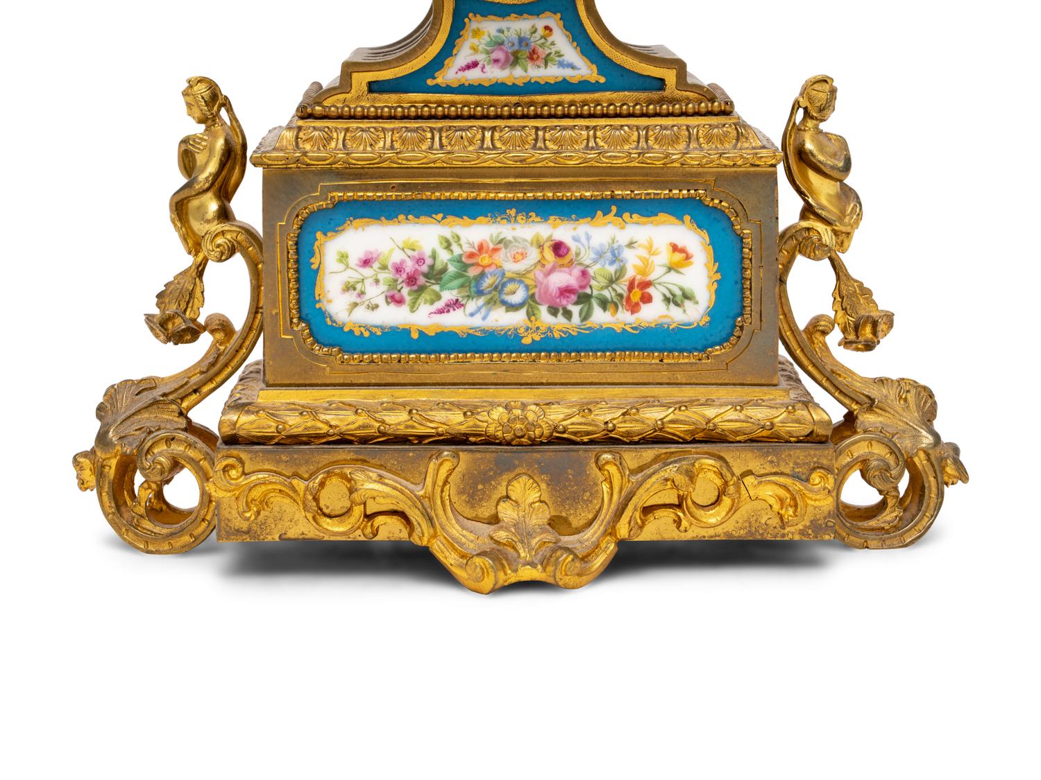 A French Gilt Metal and Porcelain Clock