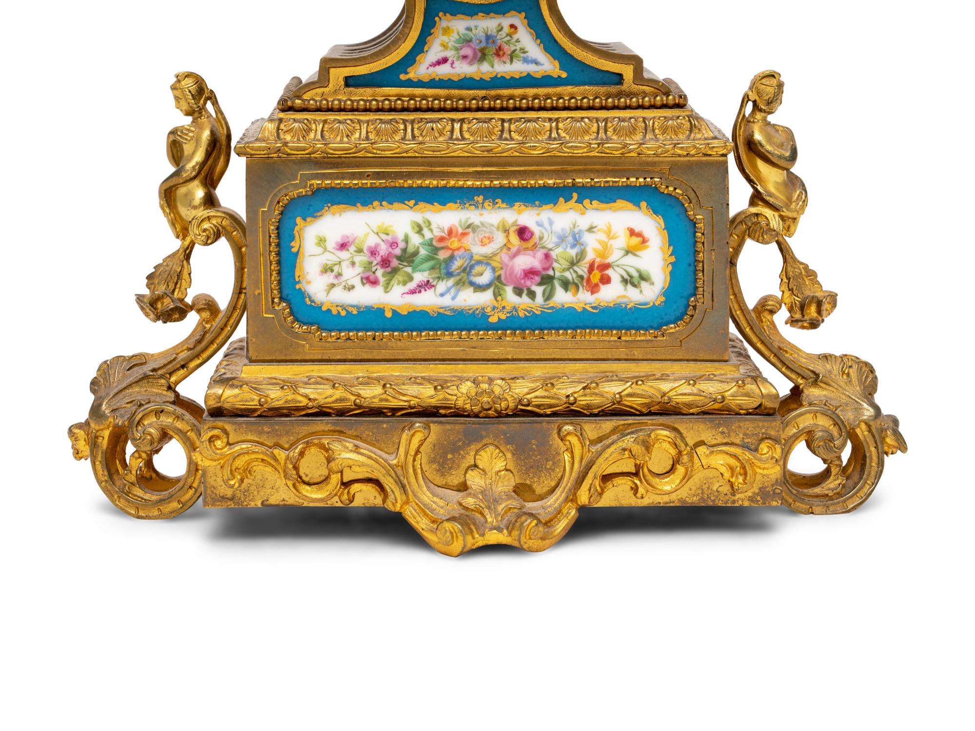 A French Gilt Metal and Porcelain Clock