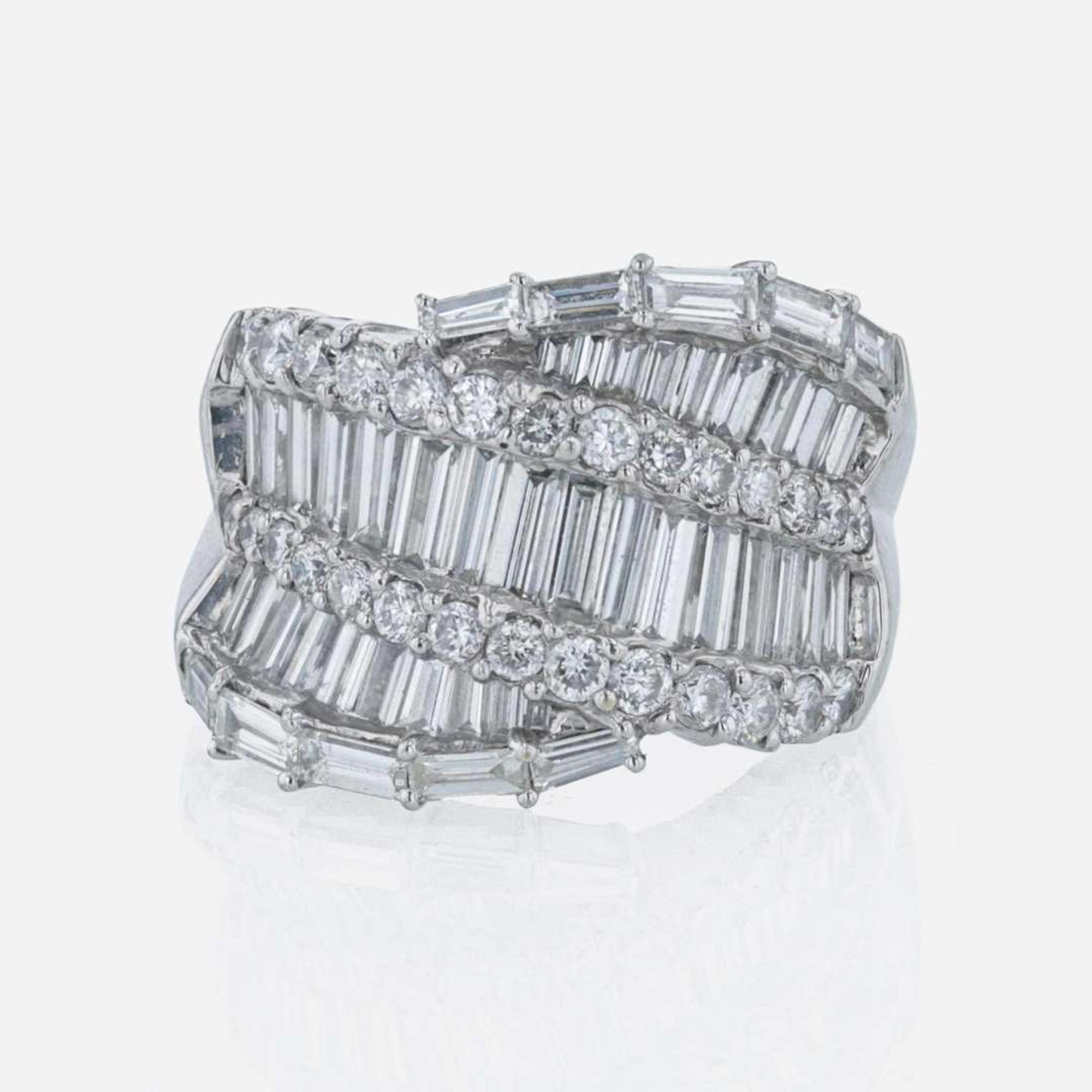 An 18K white gold and diamond ring