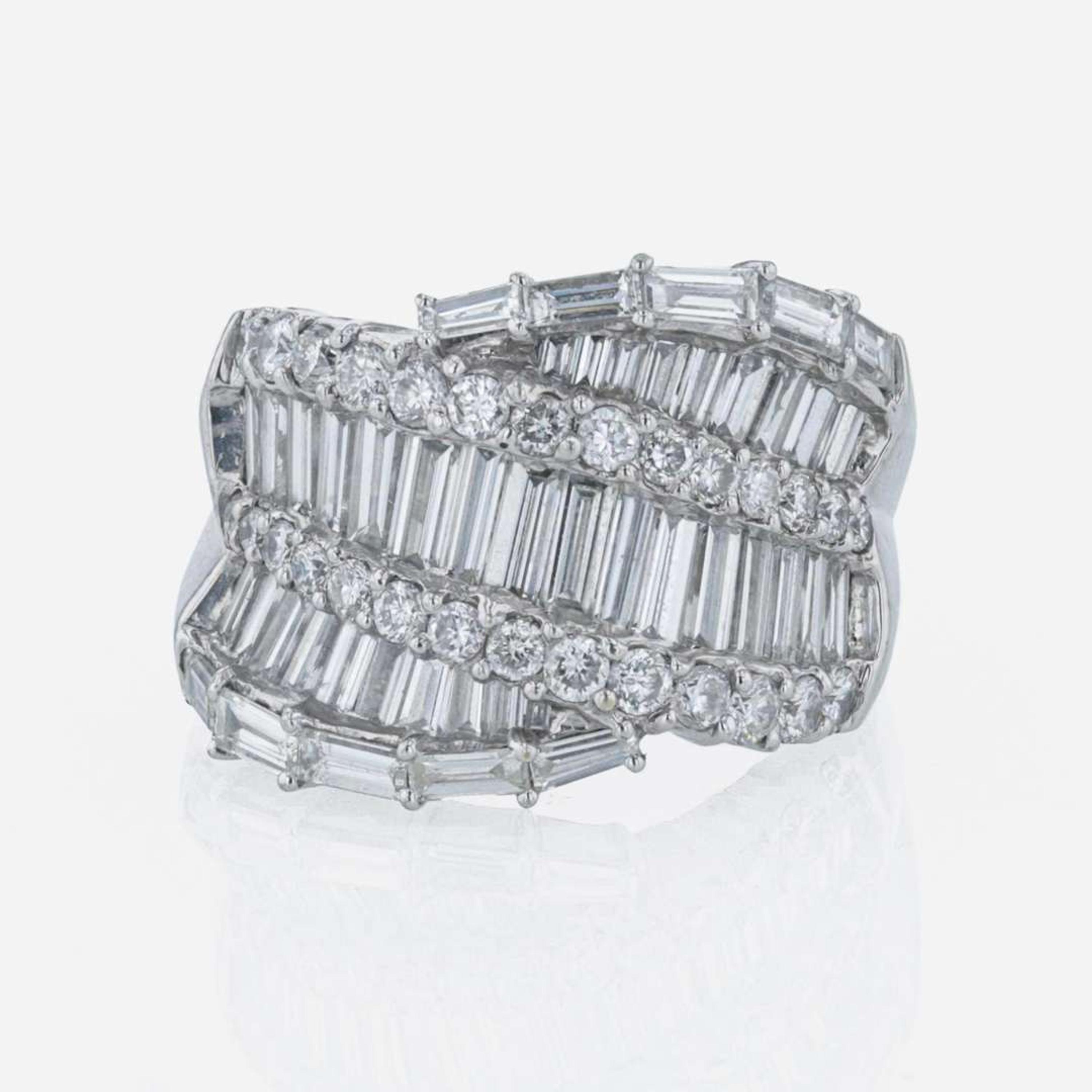 An 18K white gold and diamond ring