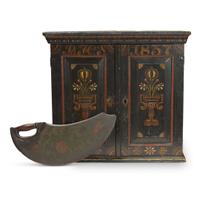 Paint-decorated wall cupboard and dough scraper Northern European, 18th-19th century