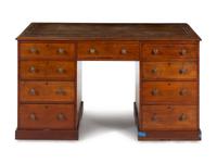 An Edwardian Walnut Partners Desk