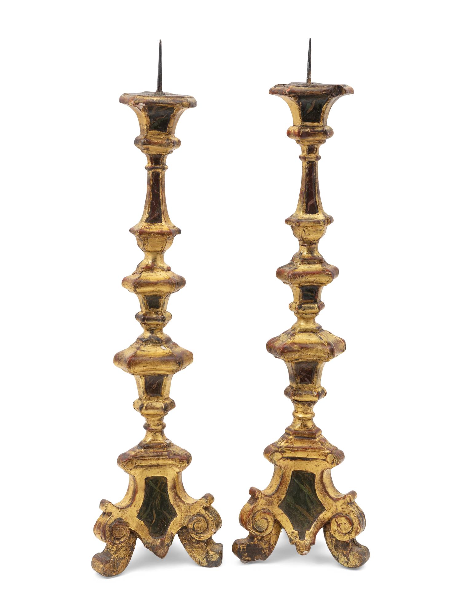 A Pair of Continental Baroque Style Painted and Giltwood Prickets