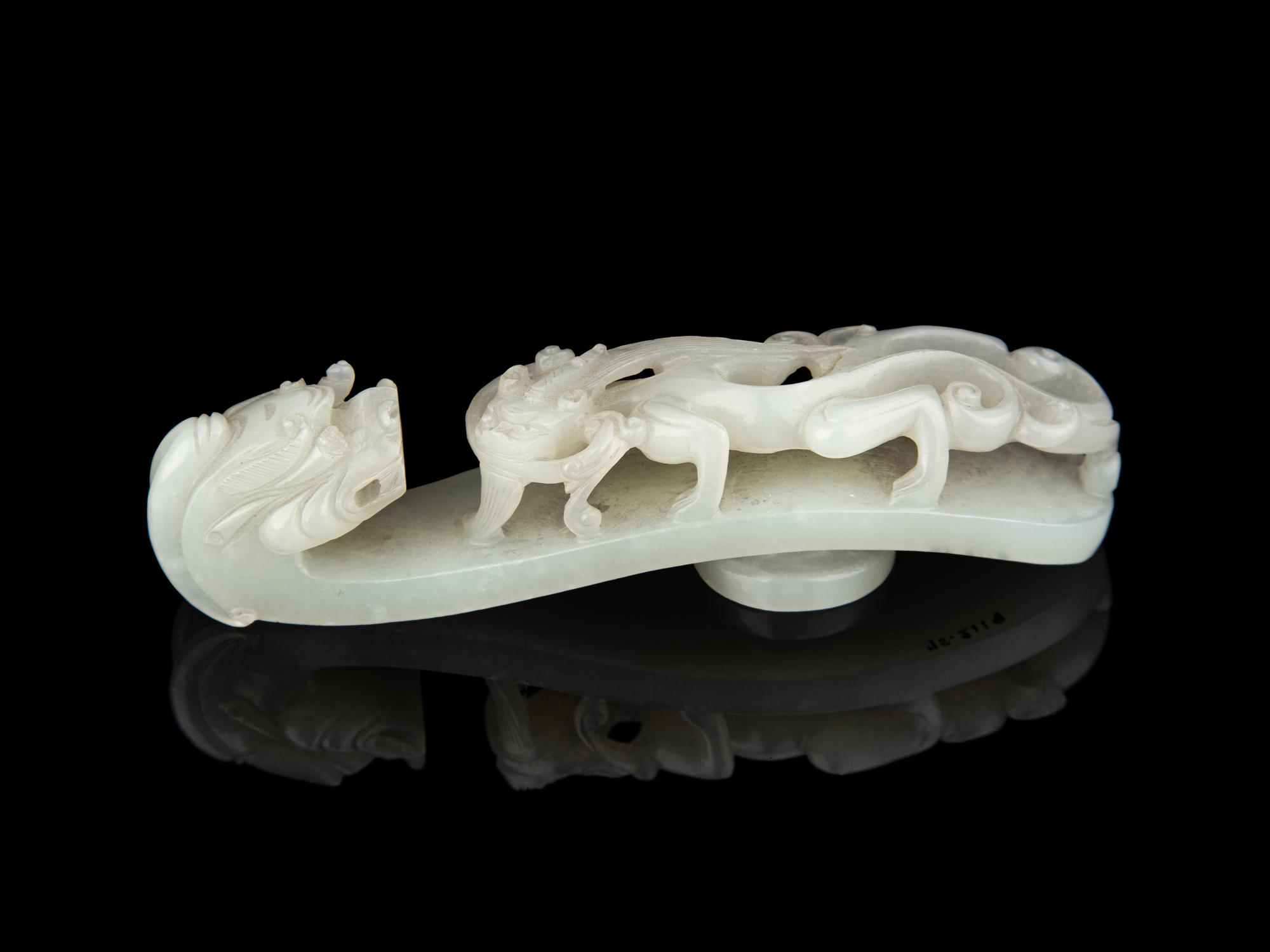 A Chinese White Jade 'Chilong' Belt Hook