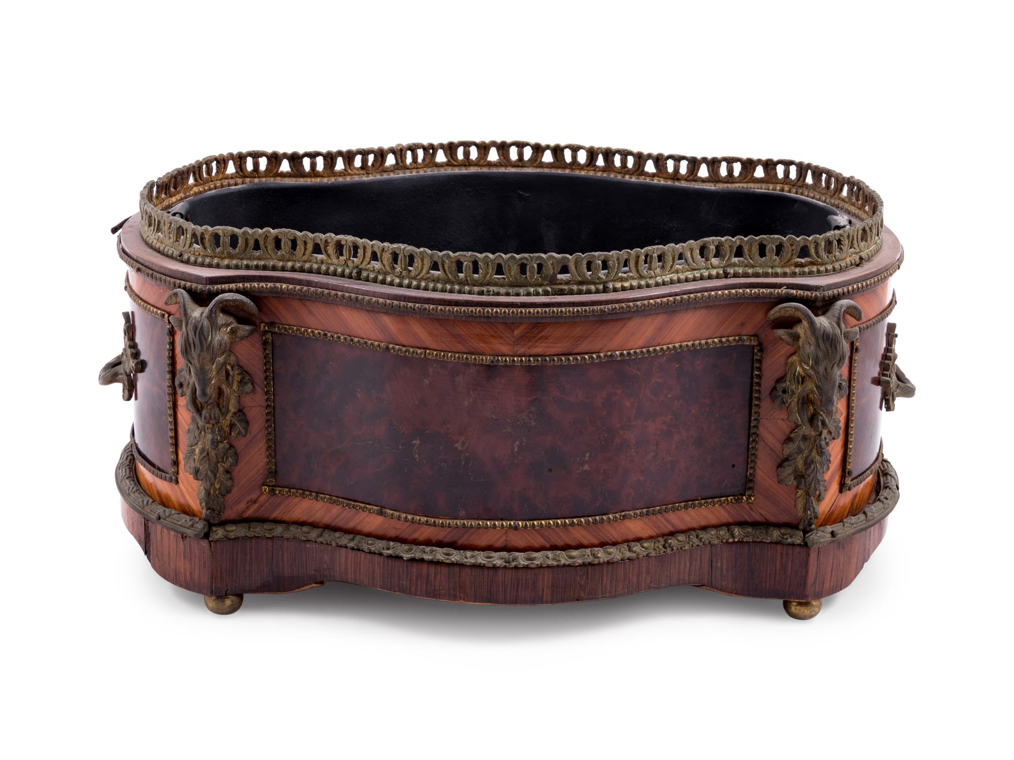 A Napoleon III Gilt Metal Mounted Burlwood Jardinière