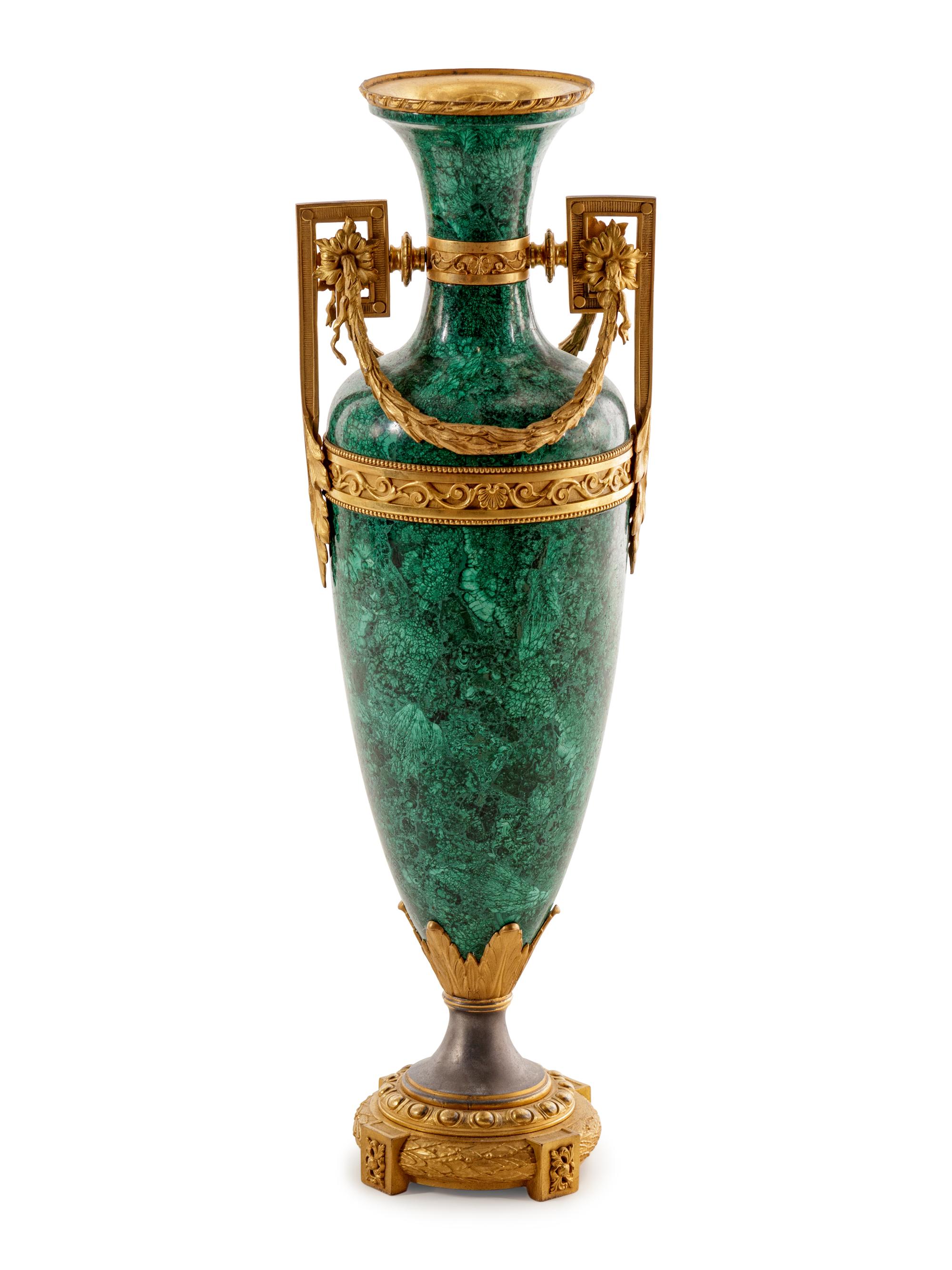 A Louis XVI Style Gilt Metal Mounted Malachite Veneered Urn