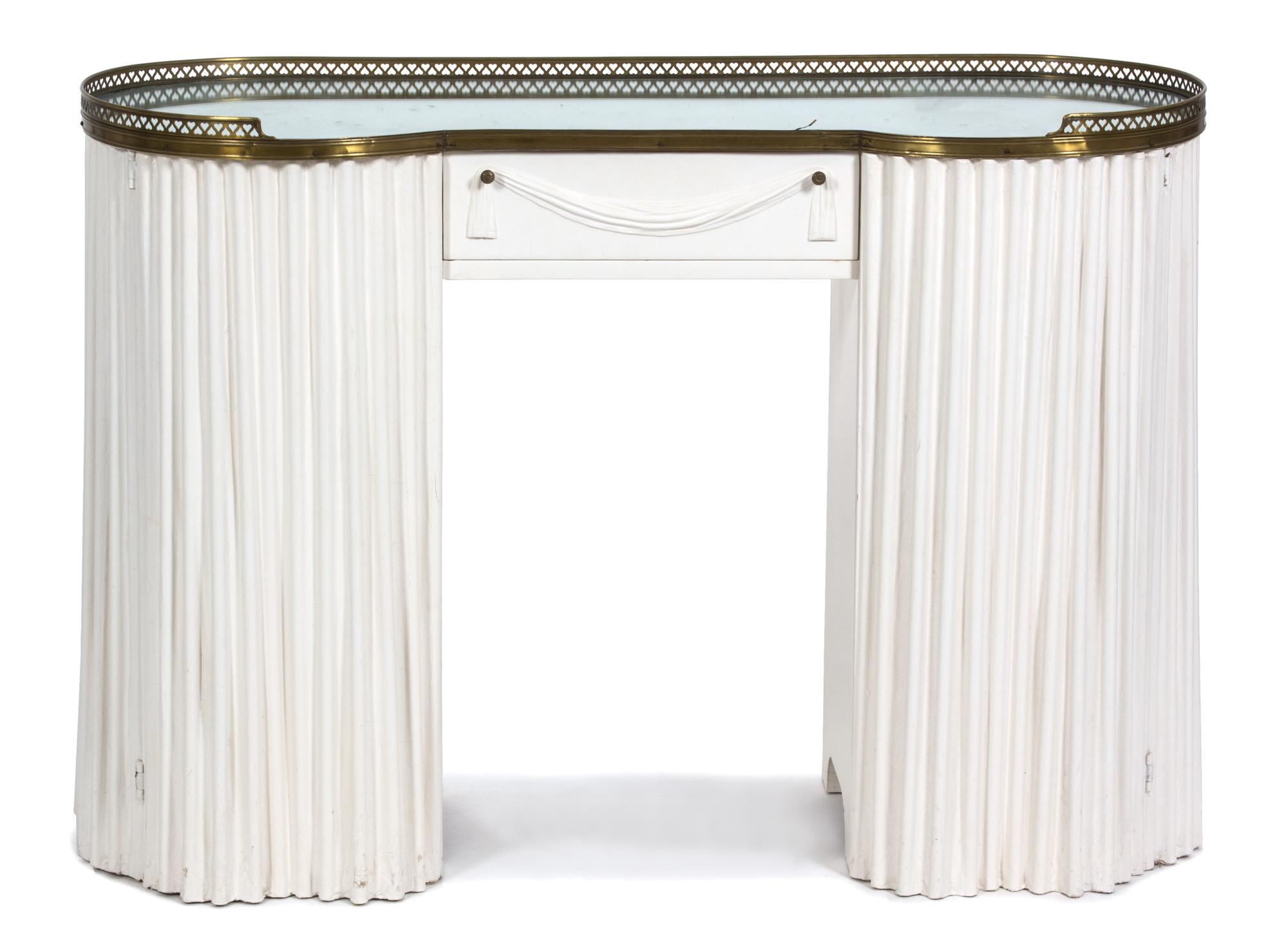 An Art Deco Kidney Shaped Lady's Vanity Table Height 31 x width 44 x depth 16 1/2 inches. — 20TH CENTURY